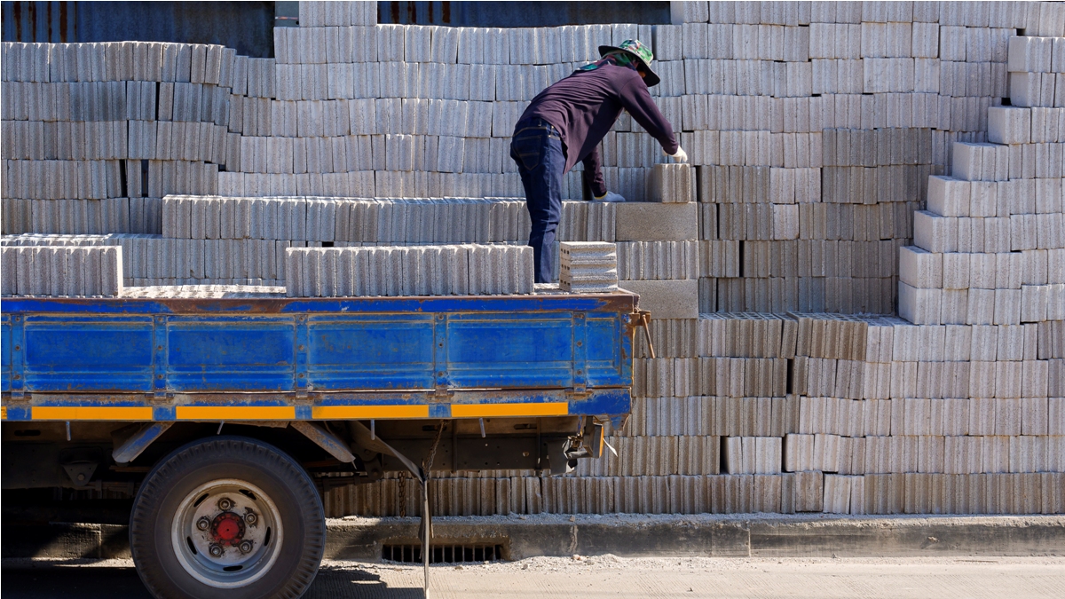rear view of asian worker are loading concrete blo 2022 12 31 05 17 50 utc