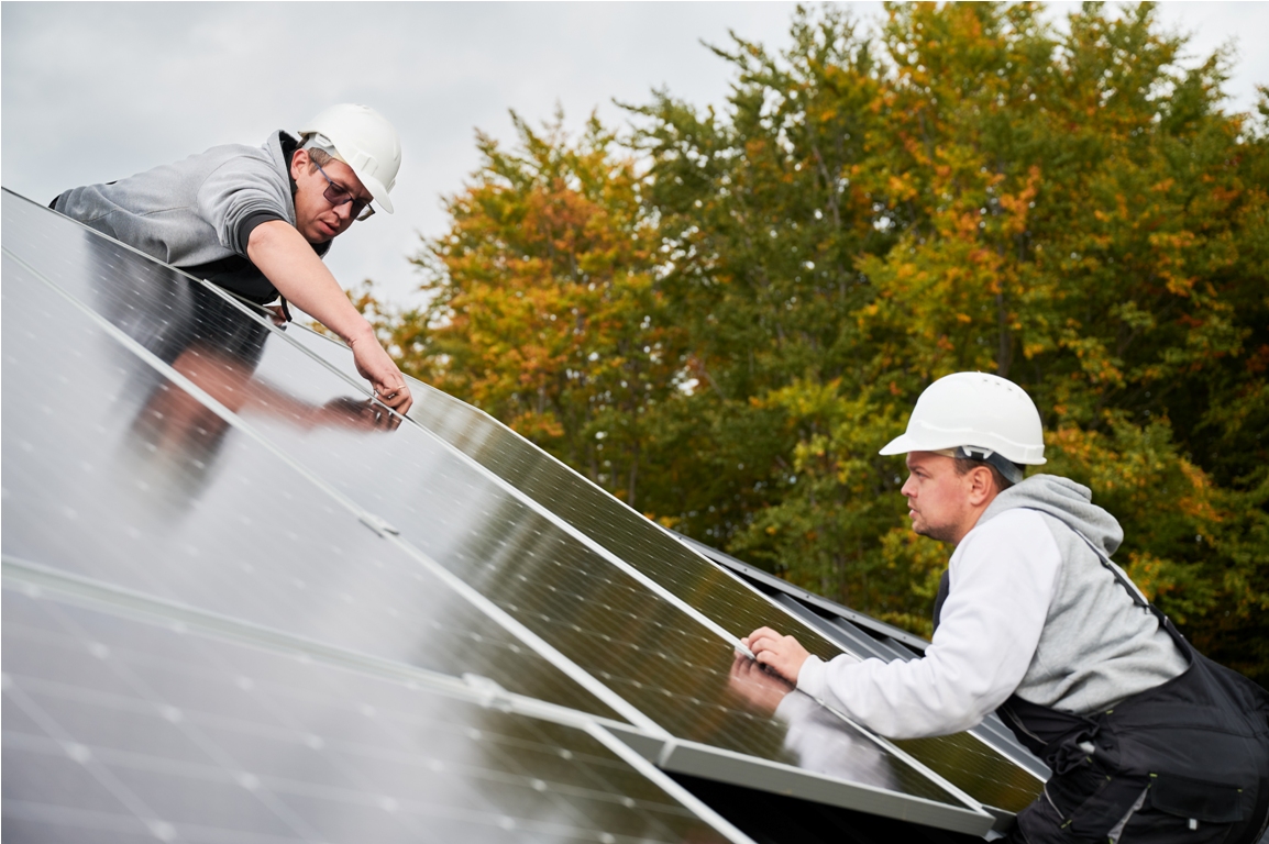 men workers installing solar panels on roof of hou 2023 08 22 00 25 02 utc
