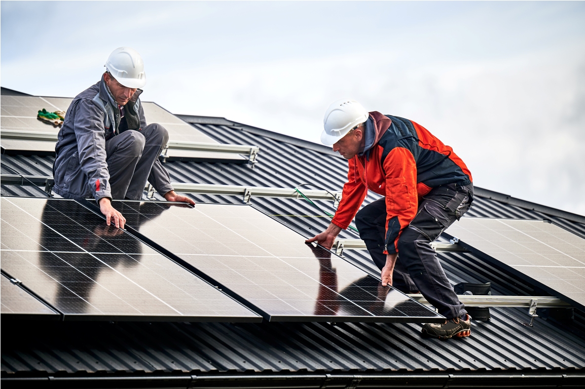 men workers installing solar panels on roof of hou 2023 11 27 05 16 28 utc