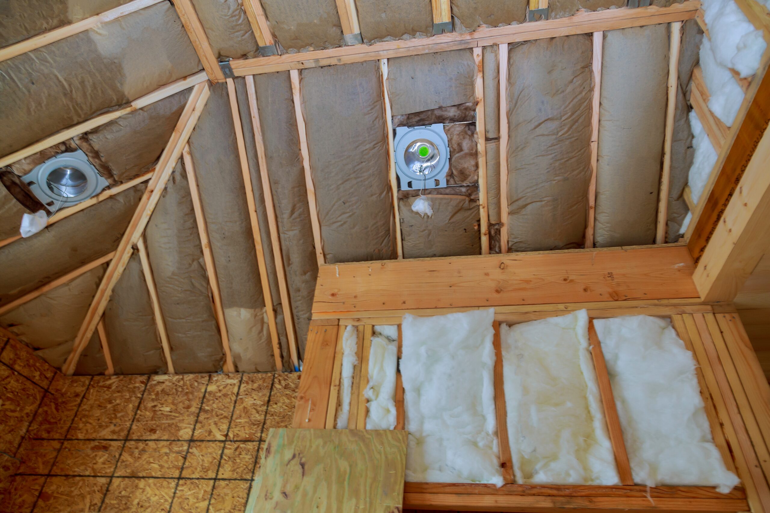 insulation in the sloping attic of a new frame house