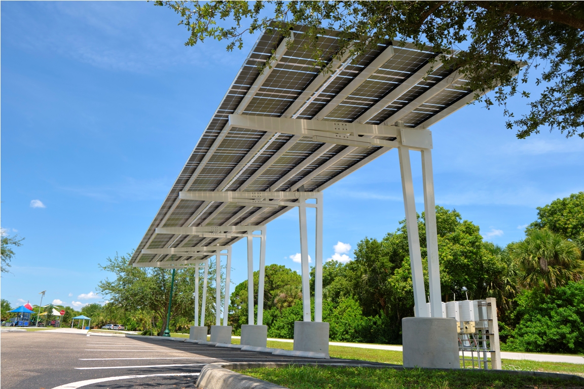 solar panels installed over parking lot canopy sha 2023 11 16 17 13 07 utc