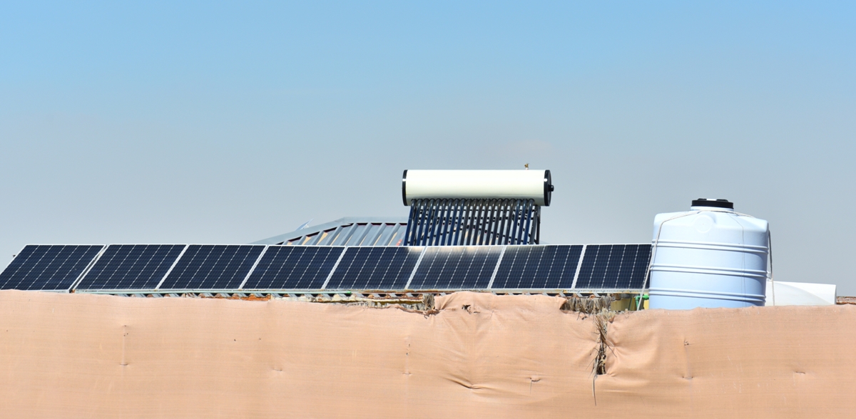 solar water heating panels on a desert farm 2023 11 27 04 57 58 utc