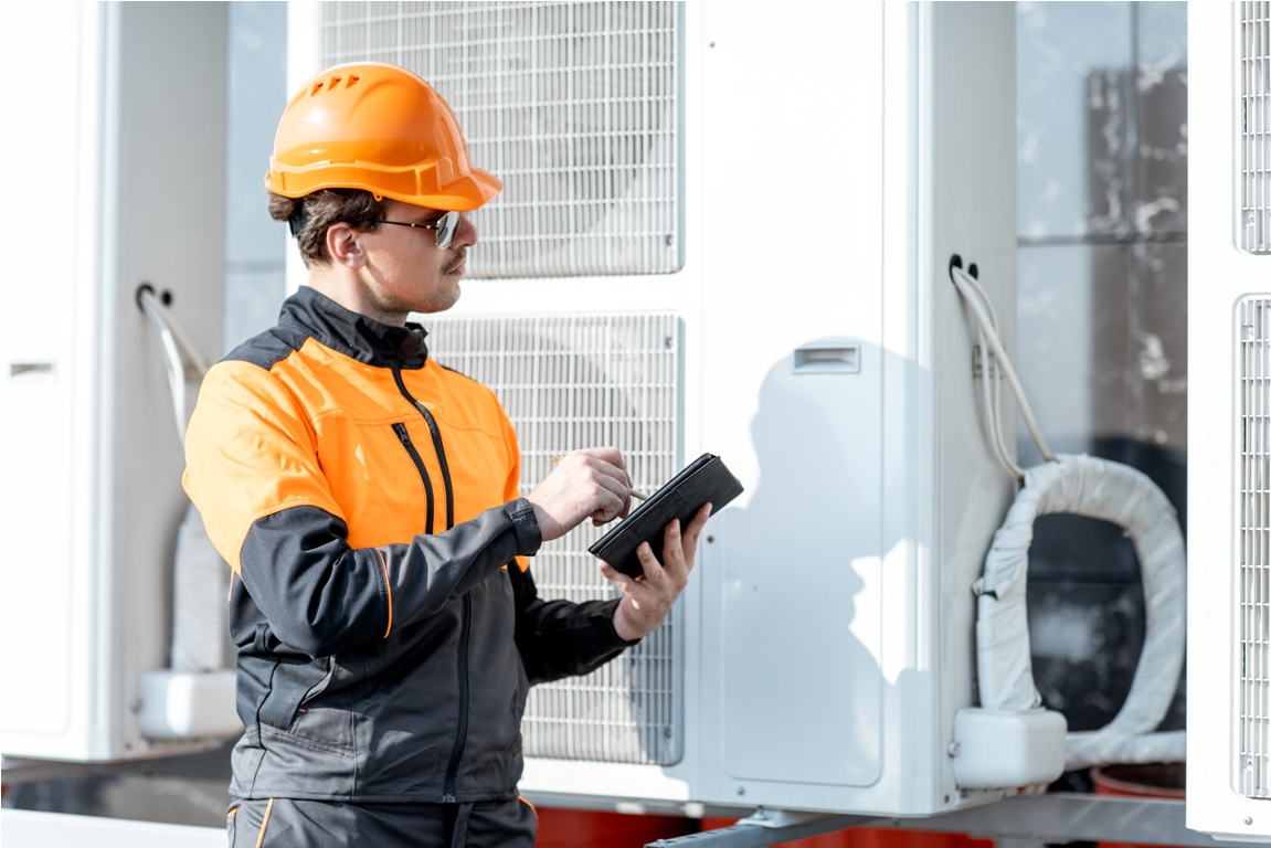 workman servicing air conditioning or heat pump wi 2021 09 02 01 01 24 utc (1)