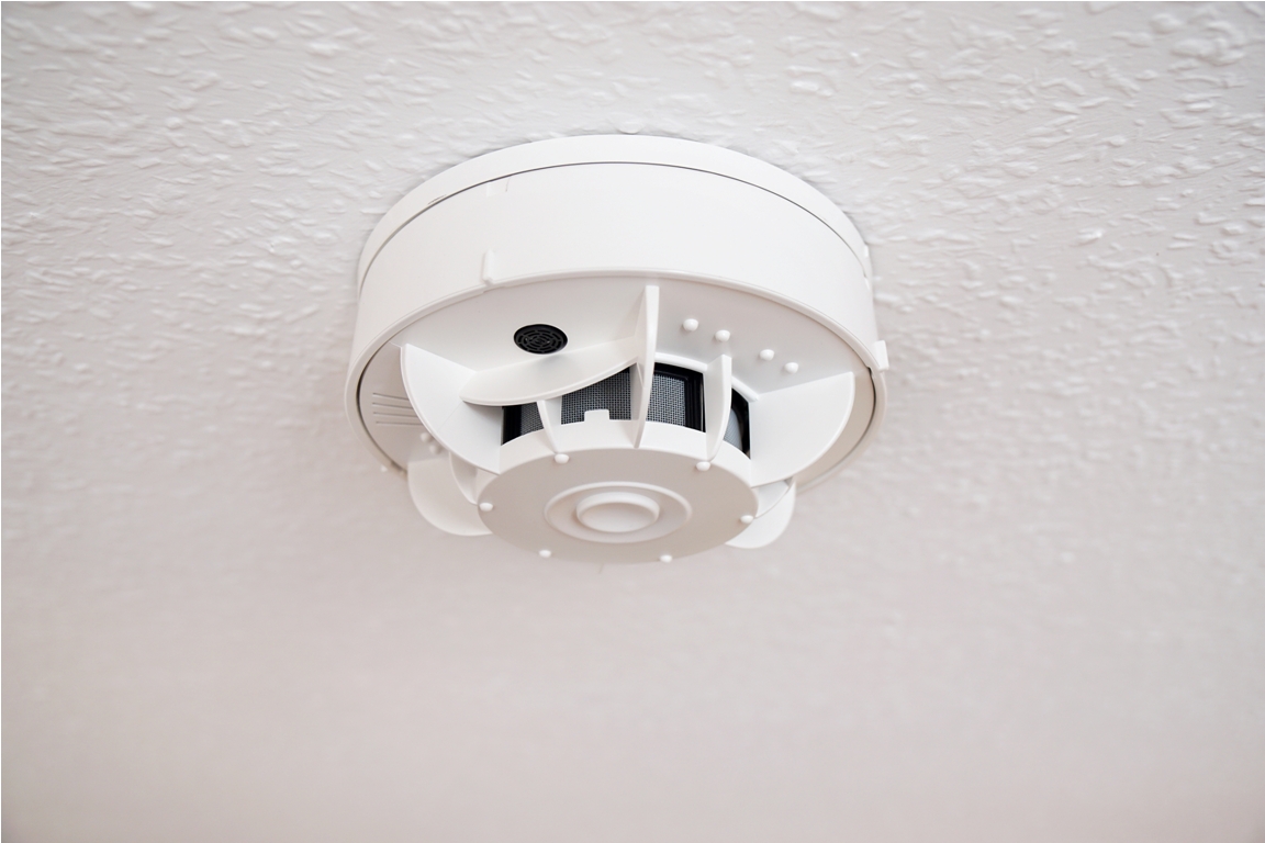 domestic smoke alarm or smoke detector at ceiling